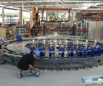 image of a FLEXSPEED carrousel being installed by two workers